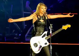 Taylor Swift on the 1989 World Tour, one of her five tours to top the annual ranking