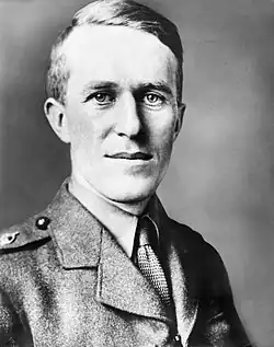 Portrait photo of Lawrence of Arabia wearing a military jacket