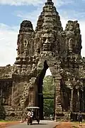 Stone corbelled gateway arch to walls of Angkor Thom (12th-17th c. city) in Cambodia