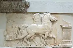 Detail of the south frieze showing a quadriga near an altar