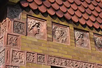 Close-up of terra cotta detailing on former Celadon office building in Alfred, New York