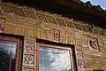 Close-up of ornamental detailing on north side of the Terra Cotta Building