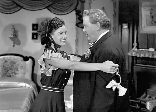 Ella Raines and Charles Laughton