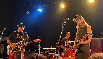 From left: Mike Bradvica, Daniel Devlin and Maisie Everett performing at La La La's, Wollongong, in August 2024.