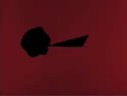 A maroon background with a black dot touching a black triangle