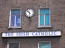A clock and sign at the former offices of the Irish Catholic on Lower Gardiner Street.