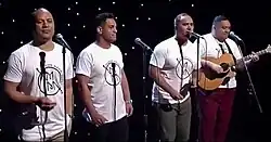 The Modern Māori Quartet performing in 2017; left to right: Francis Kora, Matariki Whatarau, James Tito, Maaka Pohatu