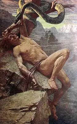 Loki is tied to a cliff, and cowers before a snake, coiled around a nearby tree and menacing at him from inches away.