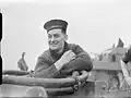 World War II Royal Canadian Navy sailor, showing the British pattern blue cap