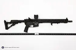 The rifle used by Crooks during the assassination attempt, with visible damage to the stock of the firearm after being struck by police gunfire at Crooks