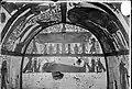 North wall (at the back) from the burial chamber. The upper register shows the winged goddess Nephthys, being worshipped by the deceased and his family. The lower register shows the mummy of the deceased, with the goddesses Nephthys (left) and the Isis (right) in the form of falcons on either side of Neferabet. Next to the goddesses are two divine figures (Khekekh and Djet).