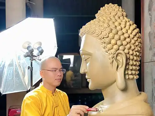 Buddha statue carved by the pagoda's abbot, Thích Trung Hiếu