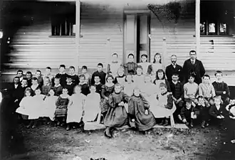 Thorndale State School students and teachers in front of the school building, via Stanthorpe, circa 1900