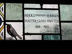 Dedication on the St John the Baptist/St Stephen window executed by Geoffrey and Daphne Robinson.