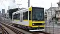 Car 8908 in yellow livery in August 2016