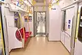 Car end section with "Priority" seating