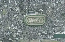 Aerial view of the Tokyo Racecourse taken in 2019, showing the outline of the course the Japan Cup takes place on.