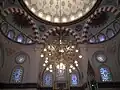 Arabic calligraphy shown on the pendentives.