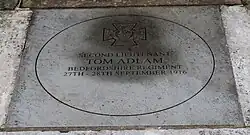Engraved stone memorial as part of the War Memorial in front of Salisbury Guildhall