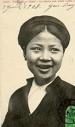 A northern Vietnamese girl smiling.