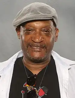 Tony Todd, an African-American male, is looking directly at the camera, wearing a hat.