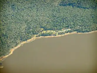 Aerial photo from the east, the village is at the top of the lake