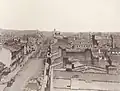 Looking east along King Street. On the north side of the street can be seen St. James Cathedral, which at that point did not have a spire. Across the street one can see St. Lawrence Hall