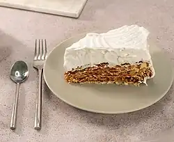 Slice of Rogel cake on a plate