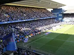 Fans in the Sir Bobby Robson Stand on the day Ipswich Town won promotion to the Championship, 29 April 2023