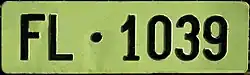 Green Liechtenstein license plate for agricultural and forestry vehicles, older series.