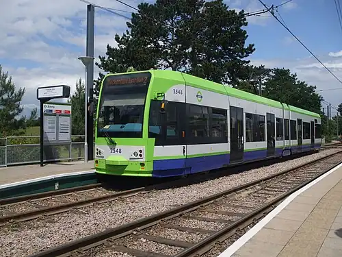 Image 24Tram 2548 calls at Arena tram stop. This is one of the trams on the Tramlink network centred on Croydon in south London.