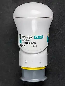 An autoinjector with 100 mg Tremfya, Guselkumab,