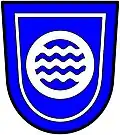 a tressure—Azure, an annulet, therewithin three barrulets wavy, conjoined, all within a tressure, argent—Umgeni Water Board, RSA