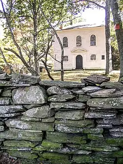 Historic wall in front of church