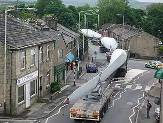 Image 48A turbine blade convoy passing through Edenfield, England (from Wind turbine)