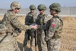 U.S. and TAF soldiers conduct the third ground combined joint patrol inside the security mechanism area in northeast Syria