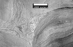 Apparent viscous flow features on the floor of Hellas, as seen by HiRISE.