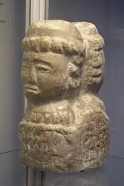A plaster copy of a bust of Svarozhits unearthed in the village, on display in the Museum of Archæology in Gdańsk
