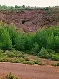 Iron mine at Tzines, with Paleolithic mine-tunnel