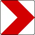 Marking for sharp bends, bridge parapets, abutment, walls, tunnel mouths, etc. Single arrow marker (to right)