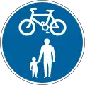Road shared by cyclists and pedestrians.