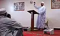 Muslim Air Force Chaplain (Captain) Walid Habash speaks to Muslim troops following a prayer service on Friday, 19 December 2009.'