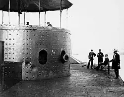 USS Monitor (1862) with the muzzle of one of its two 11-inch smoothbore Dahlgren guns showing