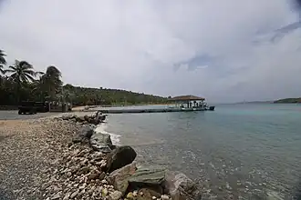 Rocky shoreline and the dock