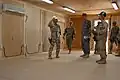 9E Commander on a completion of work tour at Patrol Base Mahawil, 2 March 2009, Iraq.