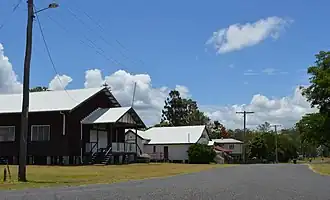 Railway Terrace, 2017. From the left the buildings shown are the Ubobo Memorial Hall, the QCWA rest rooms, the former Station Mistress' house and a private dwelling