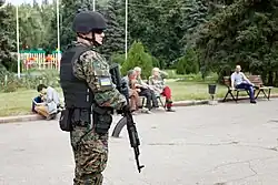 Ukrainian soldier patrolling Sloviansk in the aftermath of the Siege of Sloviansk wearing MARPAT fatigues