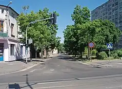 View of Lecznicza Street from Rzgowska Street (June 2008). On the right – the tallest residential building on the street (11 stories), built in 1972