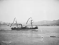 Collier Koranui passing Taiaroa Heads under the Union Steam Ship flag.