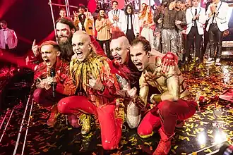 Lord of the Lost at Unser Lied für Liverpool in 2023. L–R: Pi Stoffers, Niklas Kahl, Chris Harms, Gared Dirge, Class Grenayde.